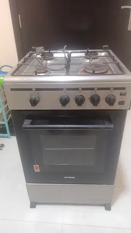 Used freestanding 4-burner gas stove with oven - good working condition