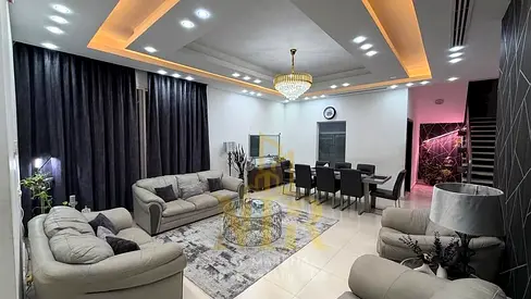 Furnished villa for sale in Al Yasmeen, Ajman. Price includes electricity, water, and air conditioning. Located on the main street, ready to move in.