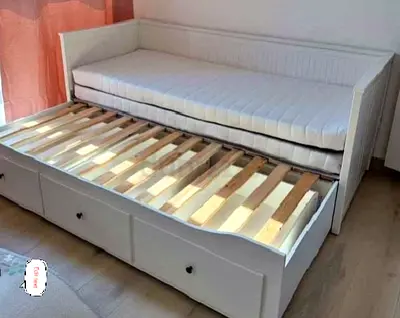 IKEA Hamnes Day bed with 3 storage drawers underneath and with 2 IKEA mattresses is available