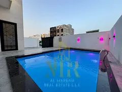 Villa for sale in Ajman, Al Helio 2 - Private pool, 5 master bedrooms, freehold, central air conditi