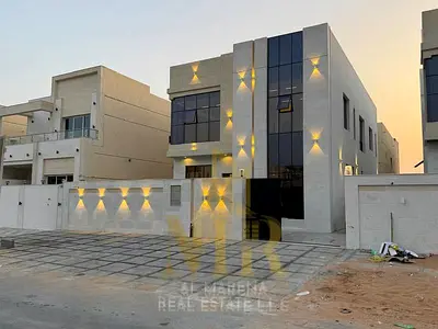 Villa for sale in Ajman, Al Helio 2 - Private pool, 5 master bedrooms, freehold, central air conditioning, registration fees included