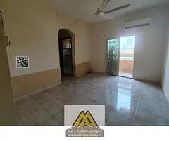 Annual Rent: 2-bedroom apartment in Al Nuaimiya 1, split AC, prime location, ideal for families, AE