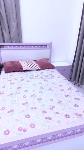 Purple and White Wooden Bed Set with Matching Nightstand