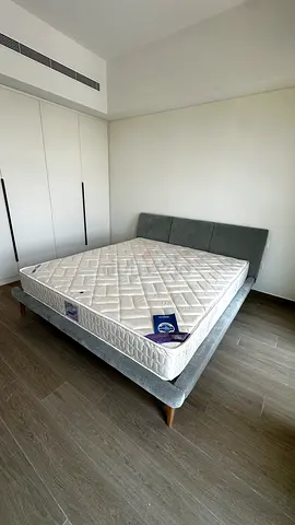 Queen bed frame with mattress - grey upholstered, good condition