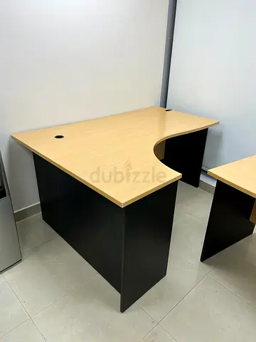 160X120 Used L-shaped Office Desk with Cable Grommets - Light Wood Top, Black Base