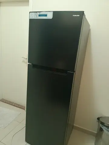 Nikai 2-Door Refrigerator - working freezer but the refrigerator is not much cooling- Black
