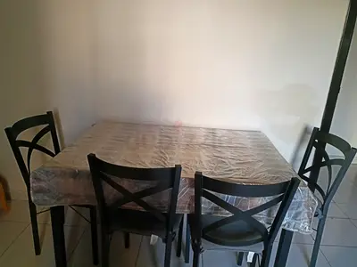Wooden 4-Seater Dining Table with Cross-Back Chairs