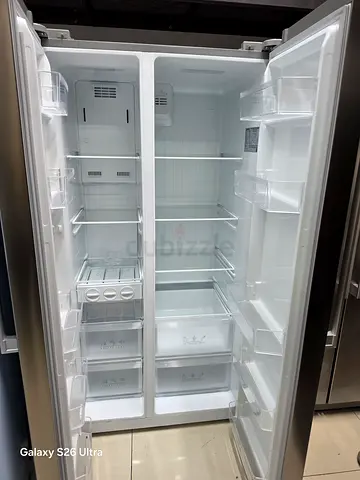 Smeg Stainless Steel Side-by-Side Refrigerator - Spacious Interior, Good Condition