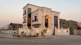 New corner villa with a full stone facade and central air conditioning with a swimming pool in a pre