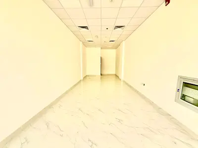 SPACIOUS SHOP FOR RENT AT PREMIUM LOCATION. READY TO MOVE IN WITH WATER & POWER SUPPLY. PERFECT FOR SHOWROOMS OR CAFES. HIGH VISIBILITY GUARANTEED