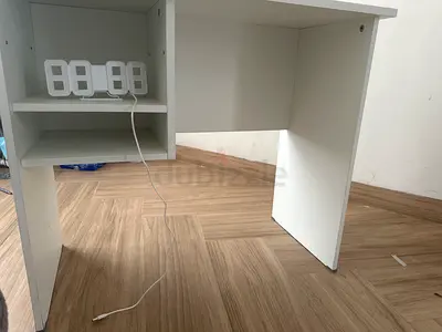 Compact white study desk with storage shelf - good condition