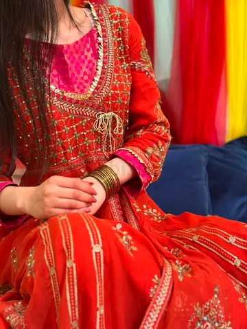 Beautiful rust embroidered Anarkali with intricate handwork and adjustable