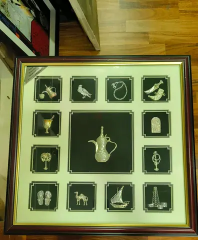 Framed Collection of Silver-tone Middle Eastern Miniatures -45x45cm