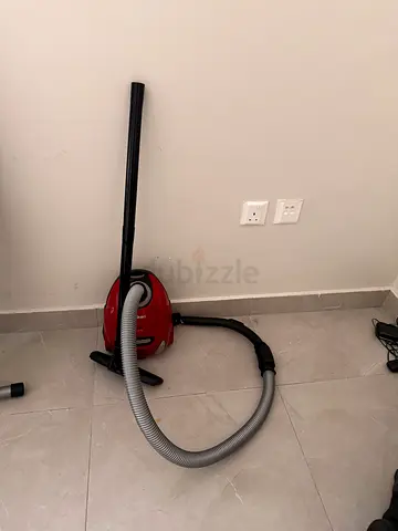 Used Red Canister Vacuum Cleaner - Good Working Condition