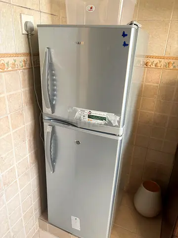 Silver Double-Door Refrigerator / Freezer - Good Working Condition