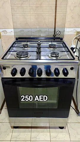 Stainless Steel 4-Burner Gas Cooker with Oven - Good Working Condition (250 AED)