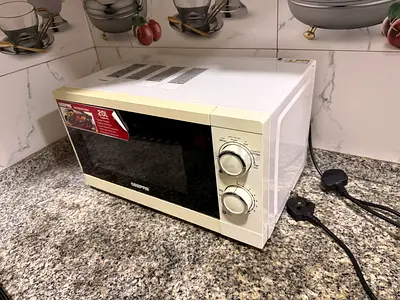 Used 20L George Foreman Microwave - Manual Dial Controls, Good Working Condition