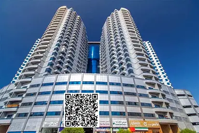 Studio for sale in Falcon Towers, Ajman, 680 sq. ft., parking, free gym & pool, close to Ajman Corniche, ideal for living or investment.