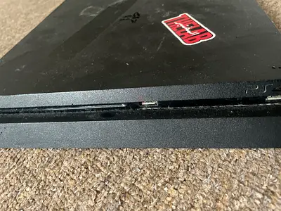 Sony PlayStation 4 Slim Used, Powers On, Some Cosmetic Wear need cleaning only not original joystick