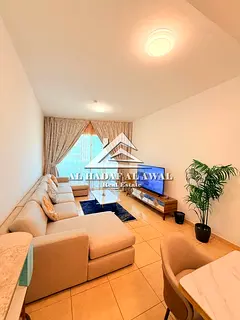 Sharjah – Al Khan Corniche area, one-bedroom apartment with living room, balcony, and two bathroom