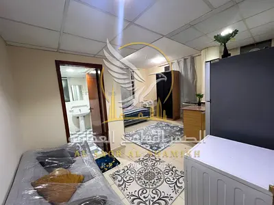Furnished studio monthly rent Al Majarah brand new free net And sandy parking near Corniche And Al Heera Beach.