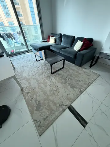Light neutral abstract area rug - good condition