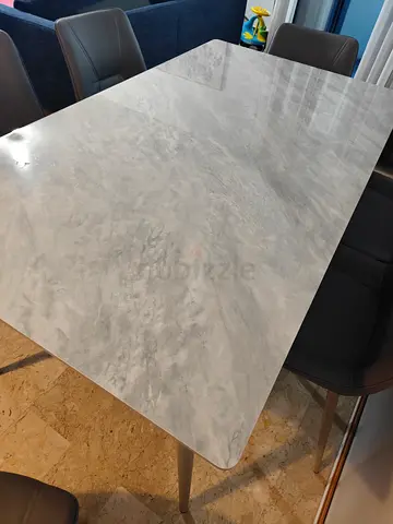 Marble top Dining table and chairs in grey colour
