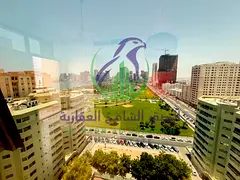 Two bedroom apartment with free air conditioning in Al Majaz 2 featuring a balcony and open view wit