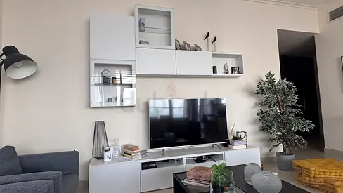 White modern wall-mounted  unit with TV console