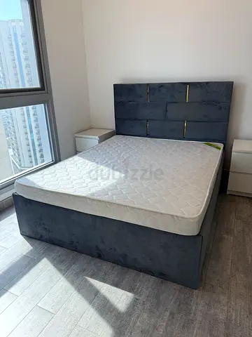 Queen size bed frames with mattress -  upholstered navy blue, good condition.
