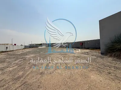 A commercial space for rent in Al Sajaa on a main road.