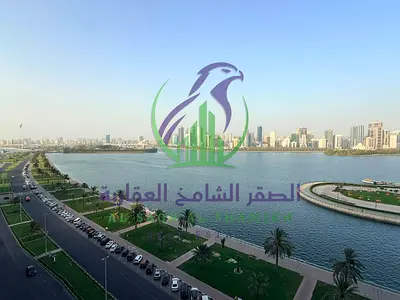 Family Annual Rental Two Bedroom Apartment in Al Majaz 3 with Sea View Two Balconies Free Parking and Panoramic Master Bedroom