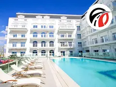 Spacious 1bhk fully fitted kitchen appliances/ 2 balconies with pool side view/ spacious layout/ lux