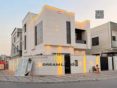Own your luxury villa in Ajman, two floors and a roof, including electricity, water and air conditioning fees, with modern designs and spacious areas