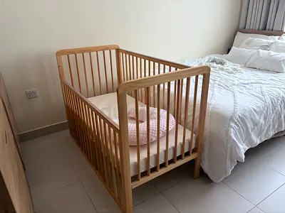 Baby Crib - Wooden Finish, Excellent Condition, Small Space Friendly