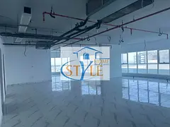 For rent: a spacious office with a sea view in Al Majaz 2, Sharjah, in an office tower from the best