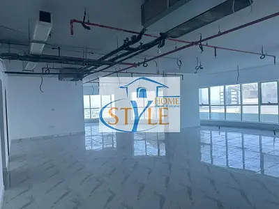 For rent: a spacious office with a sea view in Al Majaz 2, Sharjah, in an office tower from the best towers in Sharjah.