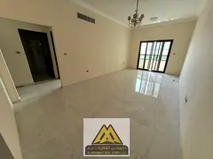 Annual rental in Al Rawda 2, Ajman: Spacious 1-bedroom apartment, central AC, family building, free
