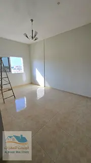 For annual rent: one bedroom, living room, and two bathrooms in Al Jurf 3, with easy access to Sharj