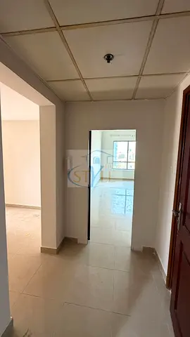 A great opportunity for living or investment: a spacious two-bedroom apartment with a living room in Al Majaz 2, offering an open view.