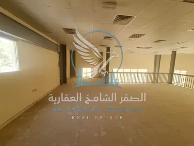 Warehouse or showroom for rent in Industrial Area 12, featuring a prime location within the industrial zone; suitable for commercial and industrial ac
