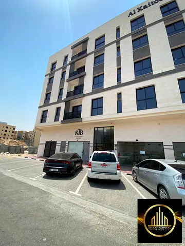 Corner building on two streets for sale in Al-Aliya, Ajman. Fully rented to families only, opposite Al-Raqaib.