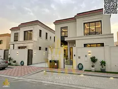 Villa for sale in Al Muwaihat 3, strategically located, two floors and a rooftop terrace, close to a