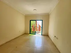 Spacious 1 BHK with Balcony | Opposite Sahara Centre | Near Ansar Mall | Family Building | Only AED 