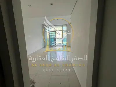 Two BR Majaz 3 balcony wardrobes free parking easy access Dubai Ajman.