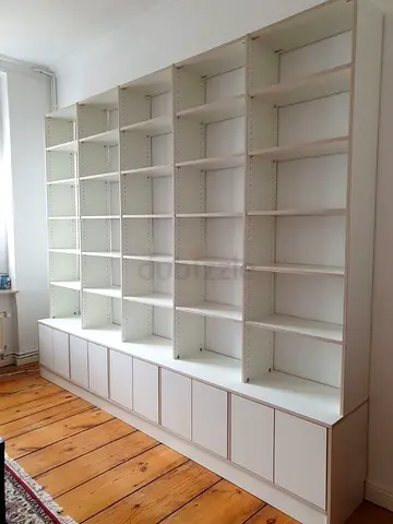 Large White Shelving Unit with Bottom Storage Cabinets