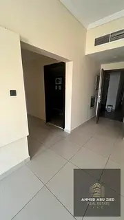 Two-bedroom apartment with a living room for annual rent in Al Rawda 2, Ajman. Includes a storage ro