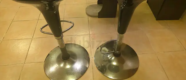 Black adjustable bar stool with chrome base