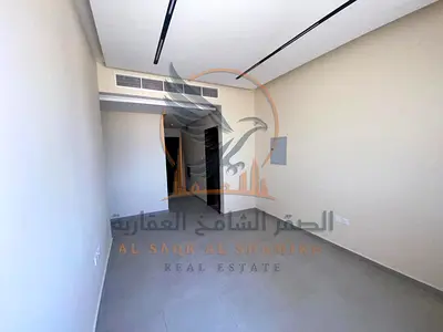 One bedroom and living room, first occupancy, with balcony, built-in wardrobes, central air conditioning in Al Jurf