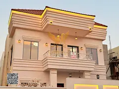 Two-story (classic) villa with a roof for sale in Ajman Price includes registration fees and is nego